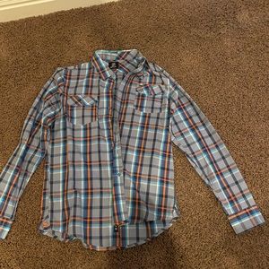 Split long sleeve button down shirt.